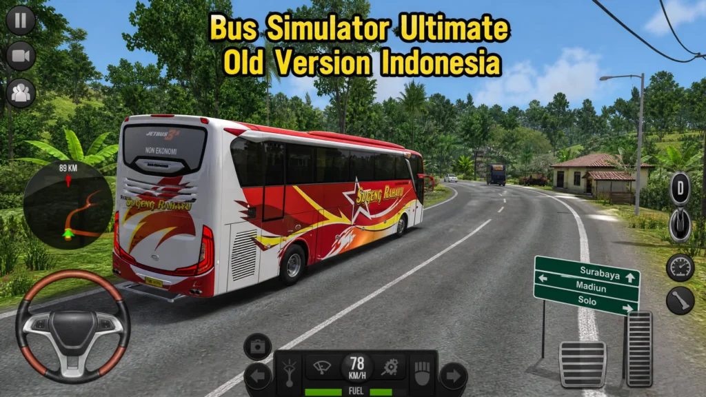 bus with a red and white Indonesian 'Sugeng Rahayu' style livery driving through the Indonesian countryside.