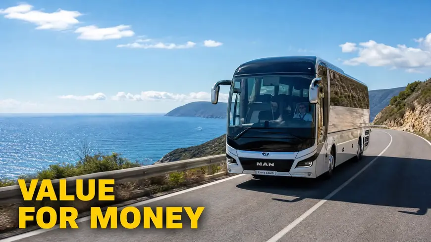 MAN Lion's Coach driving on a scenic coastal highway.